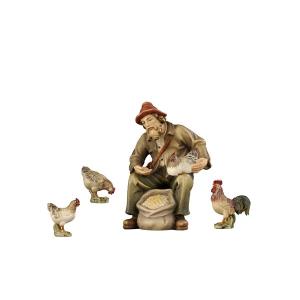 RA Pastore seduto con galline