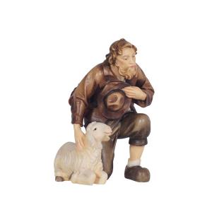 KO Shepherd kneeling with sheep