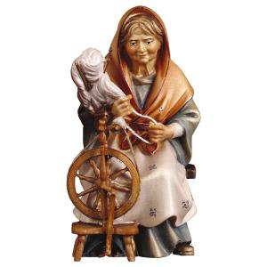 UL Old landlady with spinning wheel